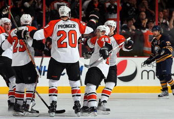PHILADELPHIA - NOVEMBER 14:  Chris Pronger #20 of the Philadelphia Flyers celebrates his goal against the Buffalo Sabres with his teammates on November 14, 2009 at Wachovia Center in Philadelphia, Pennsylvania. The Sabres defeated the Flyers 3-2.  (Photo by Jim McIsaac/Getty Images)