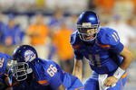 BOISE, ID - SEPTEMBER 3: Quarterback Kellen Moore #6 of the Boise State Broncos barks out signals as center Thomas Byrd #66 of the Boise State Broncos waits to snap the ball in the third quarter of the game against the Oregon Ducks at Bronco Stadium on September 3, 2009 in Boise, Idaho. Boise State won the game 19-8. (Photo by Steve Dykes/Getty Images)