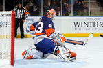 UNIONDALE, NY - OCTOBER 31:  Martin Biron #43 of the New York Islanders makes a save against the Buffalo Sabres on October 31, 2009 at Nassau Coliseum in Uniondale, New York. The Isles defeated the Sabres 5-0 and Biron earned his 200th caree victory.  (Photo by Jim McIsaac/Getty Images)