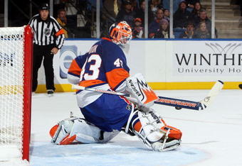 UNIONDALE, NY - OCTOBER 31:  Martin Biron #43 of the New York Islanders makes a save against the Buffalo Sabres on October 31, 2009 at Nassau Coliseum in Uniondale, New York. The Isles defeated the Sabres 5-0 and Biron earned his 200th caree victory.  (Photo by Jim McIsaac/Getty Images)