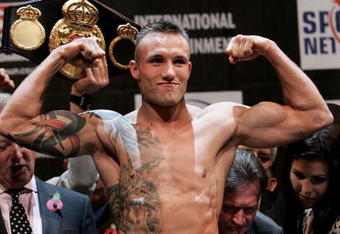 CARDIFF, WALES - NOVEMBER 2:   Mikkel Kessler goes on the scales during the weigh-in before his super-middleweight title fight against Joe Calzaghe on November 2, 2007 at St. David's Hall in Cardiff, Wales. (Photo by John Gichigi/Getty Images)