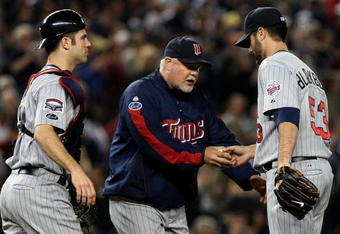 NEW YORK - OCTOBER 09:  Manager Ron Gardenhire pulls pitcher Nick Blackburn #53 of the Minnesota Twins out of the game in the sixthing inning against the New York Yankees in Game Two of the ALDS during the 2009 MLB Playoffs at Yankee Stadium on October 9, 2009 in the Bronx borough of New York City.  (Photo by Nick Laham/Getty Images)