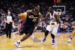 ORLANDO, FL - NOVEMBER 11:  LeBron James #23 of the Cleveland Cavaliers drives against Mickael Pietrus #20 of the Orlando Magic during the game on November 11, 2009 at Amway Arena in Orlando, Florida. NOTE TO USER: User expressly acknowledges and agrees that, by downloading and/or using this Photograph, user is consenting to the terms and conditions of the Getty Images License Agreement. (Photo by Sam Greenwood/Getty Images)