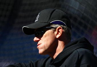 PHILADELPHIA - OCTOBER 08:  Manager Jim Tracy of the Colorado Rockies looks on during batting practice prior to Game Two of the NLDS against the Philadelphia Phillies during the 2009 MLB Playoffs at Citizens Bank Park on October 8, 2009 in Philadelphia, Pennsylvania.  (Photo by Chris McGrath/Getty Images)