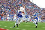 LAWRENCE, KS - NOVEMBER 15:  Jordan Shipley #8 of the Texas Longhorns attempts to make a reception as Phillip Strozier #26 of the Kansas Jayhawks defends on November 15, 2008 at Memorial Stadium in Lawrence, Kansas.  Texas defeated Kansas 35-7. (Photo by G. Newman Lowrance/Getty Images)