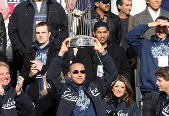 NEW YORK - NOVEMBER 06:  Captain Derek Jeter #2 of the New York Yankees celebrates with the championship trophy during the New York Yankees World Series Victory Celebration at City Hall on November 6, 2009 in New York, New York.  (Photo by Jim McIsaac/Getty Images)