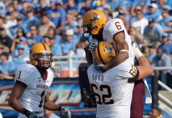 PASADENA, CA - NOVEMBER 10:  Kyle Williams #6 of the Arizona State Sun Devils celebrates his touchdown with Brandon Rodd #62 and Michael Jones #1 to trail the UCLA Bruins 7-10 during the second quarter at the Rose Bowl on November 10, 2007 in Pasadena, California.  (Photo by Harry How/Getty Images)