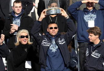 NEW YORK - NOVEMBER 06:  Captain Derek Jeter #2 of the New York Yankees celebrates with the championship trophy during the New York Yankees World Series Victory Celebration at City Hall on November 6, 2009 in New York, New York.  (Photo by Jim McIsaac/Getty Images)