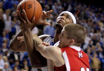 LEXINGTON, KY - NOVEMBER 16:  DeMarcus Cousins #15 of the Kentucky Wildcats is fouled by Kramer Soderberg #12 of the Miami University Redhawks during the game at Rupp Arena on November 16, 2009 in Lexington, Kentucky.  (Photo by Andy Lyons/Getty Images)