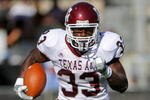BOULDER, CO - NOVEMBER 07:  Running back Christine Michael #33 of the Texas A&M Aggies rushes against the Colorado Buffaloes during NCAA college football action at Folsom Field on November 7, 2009 in Boulder, Colorado. Colorado defeated Texas A&M 35-34.  (Photo by Doug Pensinger/Getty Images)