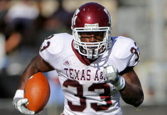 BOULDER, CO - NOVEMBER 07:  Running back Christine Michael #33 of the Texas A&M Aggies rushes against the Colorado Buffaloes during NCAA college football action at Folsom Field on November 7, 2009 in Boulder, Colorado. Colorado defeated Texas A&M 35-34.  (Photo by Doug Pensinger/Getty Images)