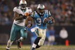 CHARLOTTE - NOVEMBER 19: DeAngelo Williams #34 of the Carolina Panthers runs the ball for a long gain in the second half against the Miami Dolphins at Bank of America Stadium on November 19, 2009 in Charlotte, North Carolina.  (Photo by Streeter Lecka/Getty Images)