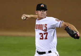 PHOENIX - OCTOBER 16:  Washington Nationals prospect Stephen Strasburg #37, playing for the Phoenix Desert Dogs, pitches in the Arizona Fall League game against the Scottsdale Scorpions at Phoenix Municipal Stadium on October 16, 2009 in Phoenix, Arizona.  (Photo by Christian Petersen/Getty Images)