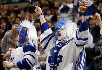 OTTAWA, ON - NOVEMBER 17:  Two lively fans of the Toronto Maple Leafs celebrate a goal against the Ottawa Senators in a game at Scotiabank Place on November 17, 2009 in Ottawa, Canada. (Photo by Phillip MacCallum/Getty Images)