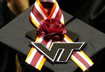 BLACKSBURG, VA - MAY 11:  A Virginia Tech graduate student displays a memorial ribbon on the top of her mortarboard cap during commencement exercises for graduate students at Cassell Coliseum on the Virginia Tech campus May 11, 2007 in Blacksburg, Virginia. Less than a month after gunman Seung-Hui Cho went on his murderous rampage, killing 32 students and faculty, about 5,000 students will be honored during commencement at the school's football stadium this evening.  (Photo by Win McNamee/Getty Images)