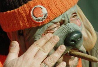 17 Dec 1995: Browns Fan Jim Vourliotis, of Parma Heights, Ohio, wipes tears from his eye through the dog mask he was wearing before the start of the Cleveland Browns v Cincinnati Bengals game at Cleveland Stadium stadium in Cleveland, Ohio. This was the B