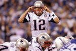 INDIANAPOLIS - NOVEMBER 15: Quarterback Tom Brady #12 of the New England Patriots calls a play in the fourth quarter of the game against the Indianapolis Colts at Lucas Oil Stadium on November 15, 2009 in Indianapolis, Indiana. The Colts won the game 35-34. (Photo by Jamie Squire/Getty Images)