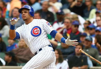CHICAGO - AUGUST 28: Aramis Ramirez #16 of the Chicago Cubs hits the ball against the New York Mets on August 28, 2009 at Wrigley Field in Chicago, Illinois. The Cubs defeated the Mets 5-2. (Photo by Jonathan Daniel/Getty Images)