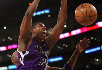 LOS ANGELES, CA - DECEMBER 12:  Jason Thompson #34 of the Sacramento Kings dunks against the Los Angeles Lakers on December 12, 2008 at Staples Center in Los Angeles, California.  The Lakers won 112-103.   NOTE TO USER: User expressly acknowledges and agrees that, by downloading and/or using this Photograph, user is consenting to the terms and conditions of the Getty Images License Agreement.  (Photo by Stephen Dunn/Getty Images)