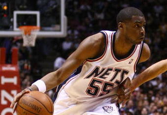 EAST RUTHERFORD, NJ - MARCH 27: Keyon Dooling #55 of the New Jersey Nets drives against the Los Angeles Lakers during the game on March 27, 2009 at the Izod Center in East Rutherford, New Jersey. NOTE TO USER: User expressly acknowledges and agrees that, by downloading and/or using this Photograph, User is consenting to the terms and conditions of the Getty Images License Agreement.  (Photo by Chris McGrath/Getty Images)