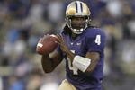 SEATTLE - SEPTEMBER 23:  Quarterback Isaiah Stanback #4 of the Washington Huskies rolls out during the game against the UCLA Bruins on September 23, 2006 at Husky Stadium in Seattle Washington. The Huskies won 29-19. (Photo by Otto Greule Jr/Getty Images) 