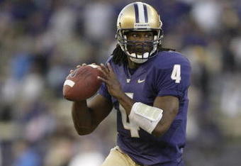 SEATTLE - SEPTEMBER 23:  Quarterback Isaiah Stanback #4 of the Washington Huskies rolls out during the game against the UCLA Bruins on September 23, 2006 at Husky Stadium in Seattle Washington. The Huskies won 29-19. (Photo by Otto Greule Jr/Getty Images) 