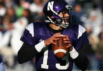 EVANSTON, IL - OCTOBER 31: Mike Kafka #13 of the Northwestern Wildcats looks for a receiver against the Penn State Nittany Lions at Ryan Field on October 31, 2009 in Evanston, Illinois. Penn State defeated Northwestern 34-13. (Photo by Jonathan Daniel/Getty Images)