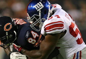 CHICAGO - AUGUST 22: Brandon  Rideau #84 of the Chicago Bears is tackled by Jonathan Goff #54 of the New York Giants during a pre-season game on August 22, 2009 at Soldier Field in Chicago, Illinois. The Bears defeated the Giants 17-3. (Photo by Jonathan Daniel/Getty Images)