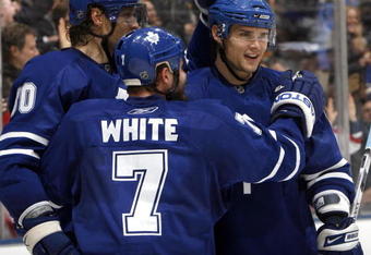 TORONTO - FEBRUARY 19: Nik Antropov #80, Ian White #7 and Alexei Ponikarovsky #23 of the Toronto Maple Leafs celebrate Nik Antropov's goal during game action February 19, 2009 at the Air Canada Centre in Toronto, Ontario, Canada. (Photo by Dave Abel/Getty Images)