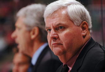 EAST RUTHERFORD, NJ - OCTOBER 14:  Head coach Ken Hitchcock of the Philadelphia Flyers looks on against the New Jersey Devils at Continental Airlines Arena on October 14, 2006 in East Rutherford, New Jersey. The Devils won 3-2.  (Photo by Norman Y. Lono/Getty Images)