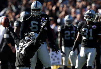 OAKLAND, CA - NOVEMBER 15:  Chris Johnson #37 of the Oakland Raiders celebrates after an interception against the Kansas City Chiefs during an NFL game at Oakland-Alameda County Coliseum on November 15, 2009 in Oakland, California. (Photo by Jed Jacobsohn/Getty Images)