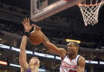 LOS ANGELES, CA - JANUARY 11:  Marcus Camby #23 of the Los Angeles Clippers blocks the shot by Louis Amundson #17 of the Phoenix Suns on January 11, 2009 at Staples Center in Los Angeles, California.  The Suns won 109-103.   NOTE TO USER: User expressly acknowledges and agrees that, by downloading and/or using this Photograph, user is consenting to the terms and conditions of the Getty Images License Agreement.  (Photo by Stephen Dunn/Getty Images)