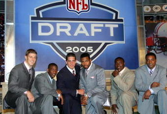 NEW YORK - APRIL 23:  (L-R) Alex Smith (Utah), Antrel Rolle (Miami), Aaron Rodgers (California), Braylon Edwards (Michigan),Ronnie Brown (Auburn) and Cedric Benson (Texas) pose during the 70th NFL Draft on April 23, 2005 at the Jacob K. Javits Convention Center in New York City.  (Photo by Chris Trotman/Getty Images)