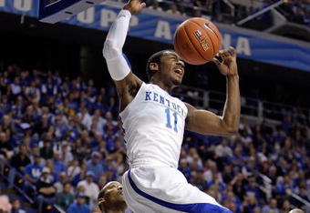 LEXINGTON, KY - NOVEMBER 21: John Wall #11 of the Kentucky Wildcats dunks the ball during the game against the Rider Broncs on November 21, 2009 at Rupp Arena in Lexington, Kentucky.  (Photo by Andy Lyons/Getty Images)