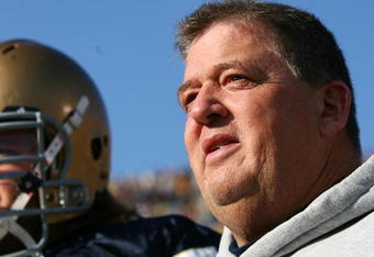 SOUTH BEND, IN - NOVEMBER 21: Head coach Charlie Weis of the Notre Dame Fighting Irish waits to enter the field for a game against the Univeristy of Connecticut Huskies at Notre Dame Stadium on November 21, 2009 in South Bend, Indiana. (Photo by Jonathan Daniel/Getty Images)
