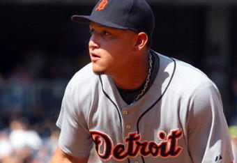 NEW YORK - JULY 19:  Miguel Cabrera #24 of the Detroit Tigers flips the ball to first base for an out against the New York Yankees on July 19, 2009 at Yankee Stadium in the Bronx borough of New York City.  (Photo by Jim McIsaac/Getty Images)