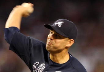PHOENIX - MAY 30:  Starting pitcher Javier Vazquez #33 of the Atlanta Braves pitches against the Arizona Diamondbacks during the major league baseball game at Chase Field on May 30, 2009 in Phoenix, Arizona.  (Photo by Christian Petersen/Getty Images)