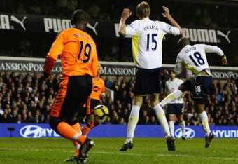 LONDON, ENGLAND - NOVEMBER 22:  Jermain Defoe of Tottenham Hotspur scores his third goal during the Barclays Premier League match between Tottenham Hotspur and Wigan Athletic at White Hart Lane on November 22, 2009 in London, England.  (Photo by Clive Rose/Getty Images)