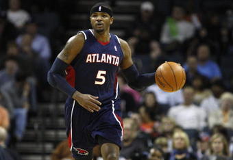 CHARLOTTE, NC - NOVEMBER 6:  Josh Smith #5 of the Atlanta Hawks drives the ball up court during the game against the Charlotte Bobcats on November 6, 2009 at Time Warner Cable Arena in Charlotte, North Carolina.  The Bobcats won 103-83.  NOTE TO USER: User expressly acknowledges and agrees that, by downloading and/or using this Photograph, user is consenting to the terms and conditions of the Getty Images License Agreement.  (Photo by Streeter Lecka/Getty Images)