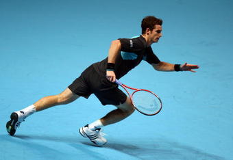 LONDON, ENGLAND - NOVEMBER 22:  Andy Murray of Great Britain in action during the men's singles first round match against Juan Martin Del Potro of Argentina during the Barclays ATP World Tour Finals at the O2 Arena on November 22, 2009 in London, England.  (Photo by Clive Brunskill/Getty Images)