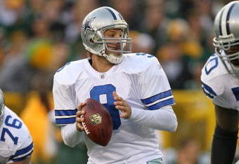 GREEN BAY, WI - NOVEMBER 15: Tony Romo #8 of the Dallas Cowboysdrops back to pass against the Green Bay Packers at Lambeau Field on November 15, 2009 in Green Bay, Wisconsin. The Packers defeated the Cowboys 17-7. (Photo by Jonathan Daniel/Getty Images)
