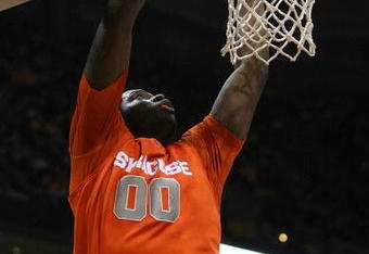 MILWAUKEE - MARCH 07: Rick Jackson #00 of the Syracuse Orange dunks the ball against the Marquette Golden Eagles on March 7, 2009 at the Bradley Center in Milwaukee, Wisconsin. Syracuse defeated Marquette 86-79 in overtime. (Photo by Jonathan Daniel/Getty Images)
