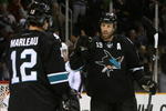 SAN JOSE, CA - DECEMBER 04:  Joe Thornton #19 of the San Jose Sharks celebrates with Patrick Marleau #12 after Marleau scored a second period power play goal against the Columbus Blue Jackets during the NHL game at HP Pavilion on December 4, 2008 in San Jose, California.  (Photo by Christian Petersen/Getty Images)