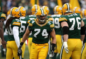 GREEN BAY, WI - NOVEMBER 30:  Aaron Kampman #74 of the Green Bay Packers takes the field during player ingtroductions against the Carolina Panthers at Lambeau Field on November 30, 2008 in Green Bay, Wisconsin. The Panthers won 35-31.  (Photo by Jonathan Daniel/Getty Images)