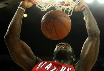 OAKLAND, CA - NOVEMBER 20:  Greg Oden #52 of the Portland Trail Blazers dunks against the Golden State Warriors during an NBA game at Oracle Arena on November 20, 2009 in Oakland, California.  (Photo by Jed Jacobsohn/Getty Images)