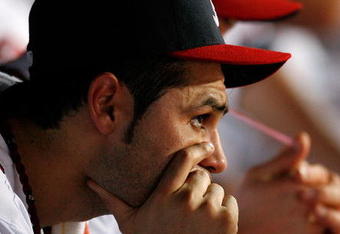 ATLANTA - JUNE 26:  Pitcher Mike Gonzalez #51 of the Atlanta Braves looks on from the dugout in the bottom of the ninth inning against the Boston Red Sox at Turner Field on June 26, 2009 in Atlanta, Georgia.  (Photo by Kevin C. Cox/Getty Images)