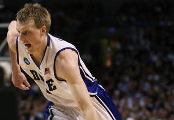 BOSTON - MARCH 26:  Kyle Singler #12 of the Duke Blue Devils drives against the Villanova Wildcats during the NCAA Men's Basketball Tournament East Regionals at TD Banknorth Garden on March 26, 2009 in Boston, Massachusetts.  (Photo by Elsa/Getty Images)