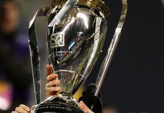 SEATTLE - NOVEMBER 22:  Kyle Beckerman #5 of Real Salt Lake holds the Philip F. Anschutz MLS Cup trophy as he and his teammates celebrate their win over the Los Angeles Galaxy in the MLS Cup final at Qwest Field on November 22, 2009 in Seattle, Washington. Real Salt Lake won 5-4 in a penalty shootout following regulation time.  (Photo by Otto Greule Jr/Getty Images)