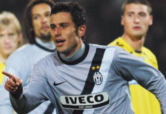 TURIN, ITALY - NOVEMBER 22:  Fabio Grosso of Juventus FC celebrates his goal during the Serie A match between Juventus and Udinese at Stadio Olimpico di Torino on November 22, 2009 in Turin, Italy.  (Photo by Valerio Pennicino/Getty Images)