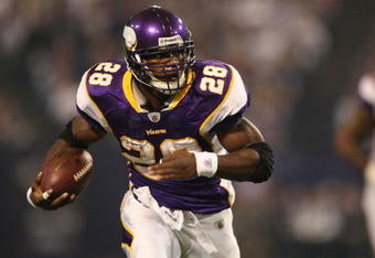 MINNEAPOLIS - NOVEMBER 22:  Adrian Peterson #28 of the Minnesota Vikings runs with the ball against the Seattle Seahawks at Hubert H. Humphrey Metrodome on November 22, 2009 in Minneapolis, Minnesota.  (Photo by Nick Laham/Getty Images)